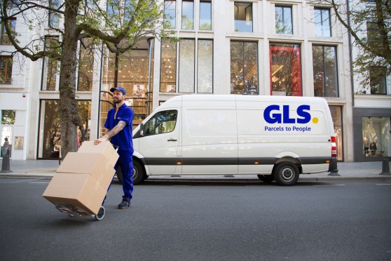 delivery man pushing cart
